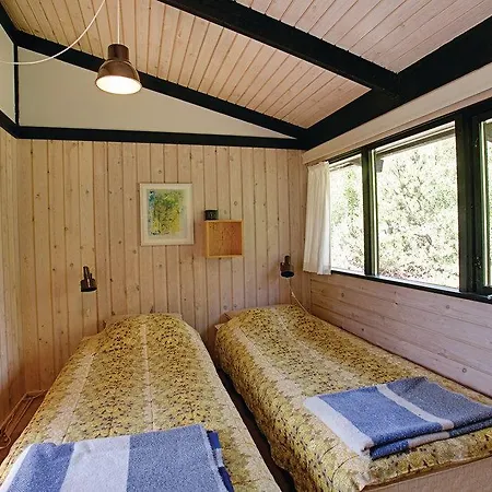 Three-bedroom Holiday Nexo With A Fireplace 01